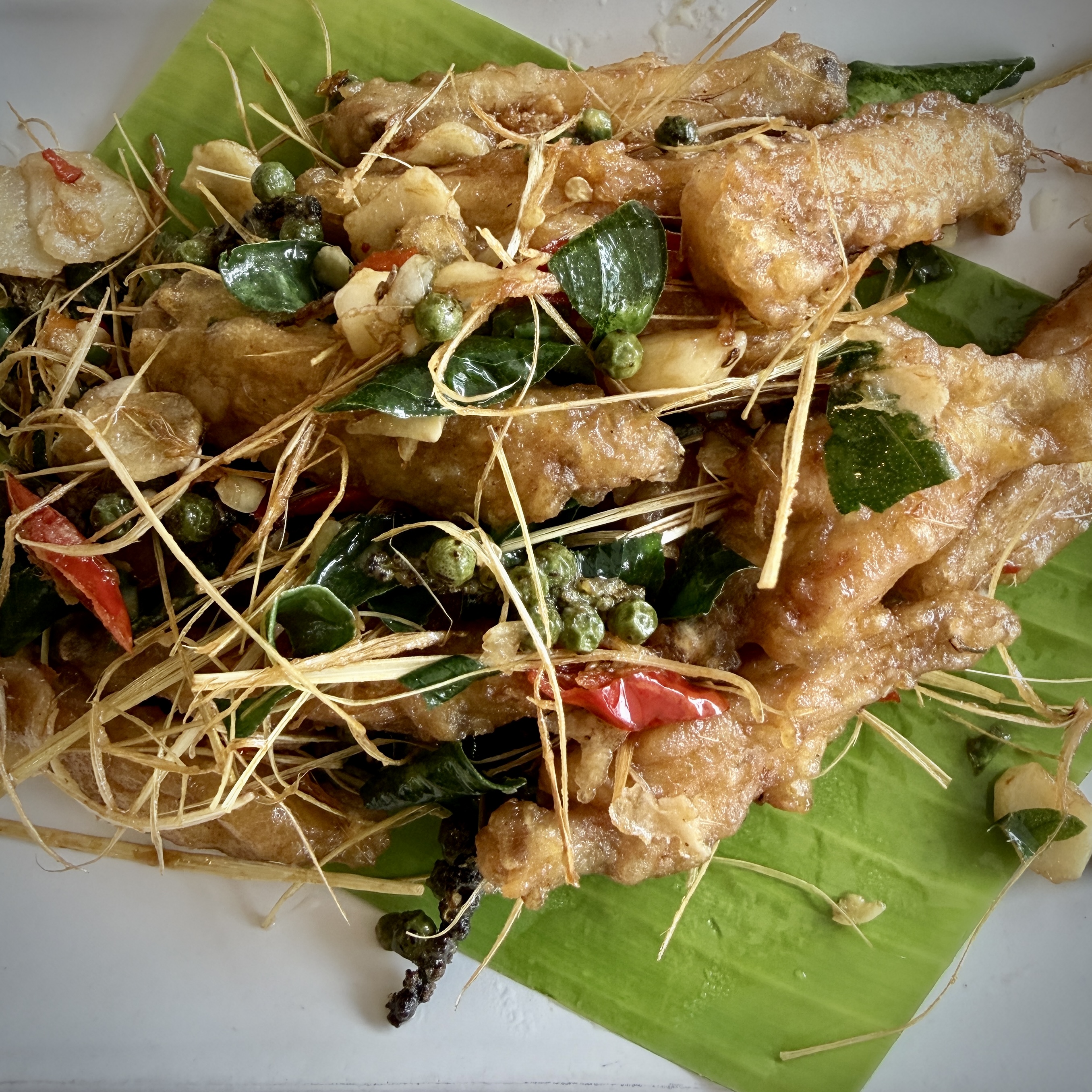 A close up image of chicken stir fried with lemongrass